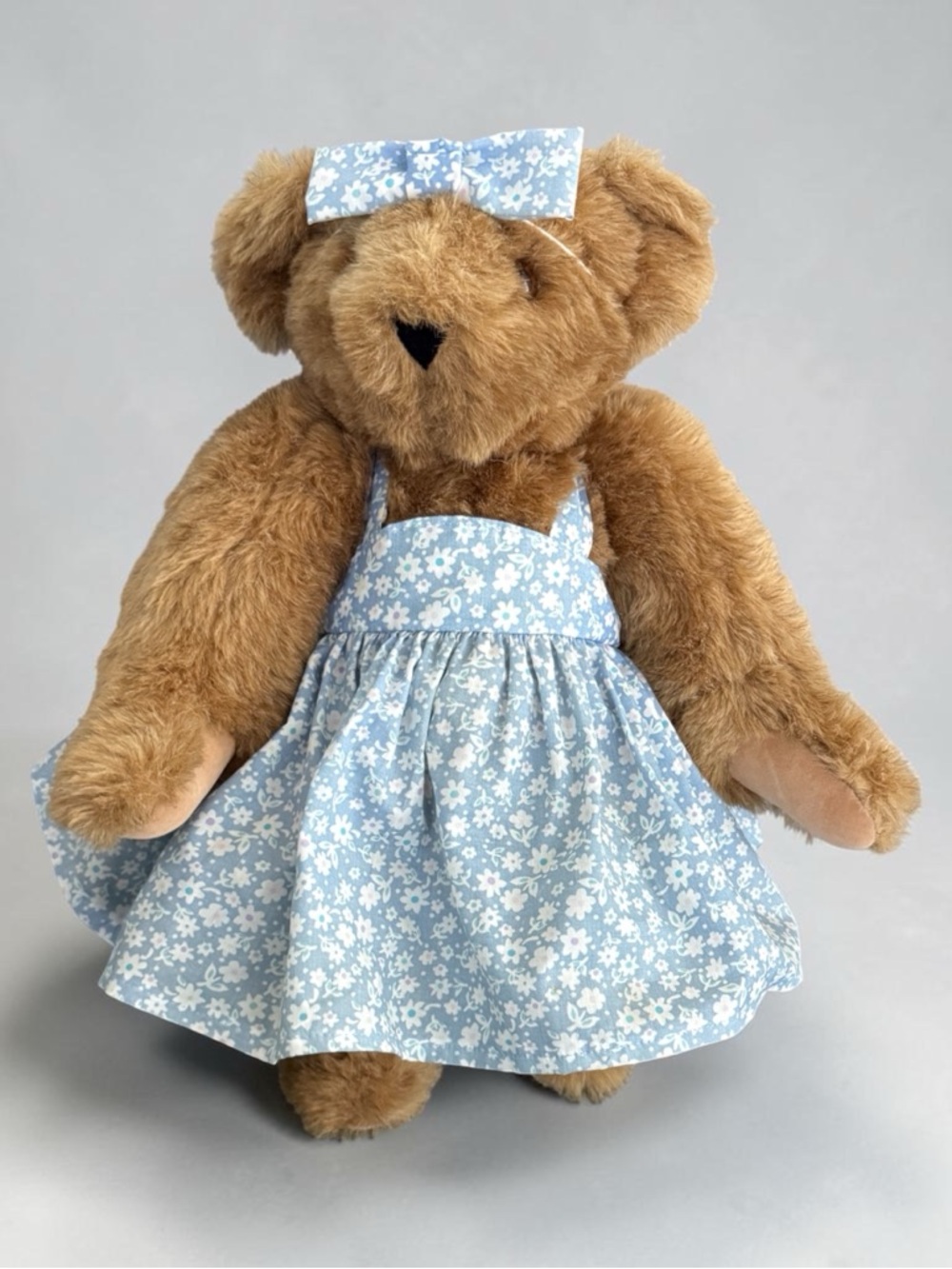 Plush Brown Teddy Bear in Light Blue Floral Dress